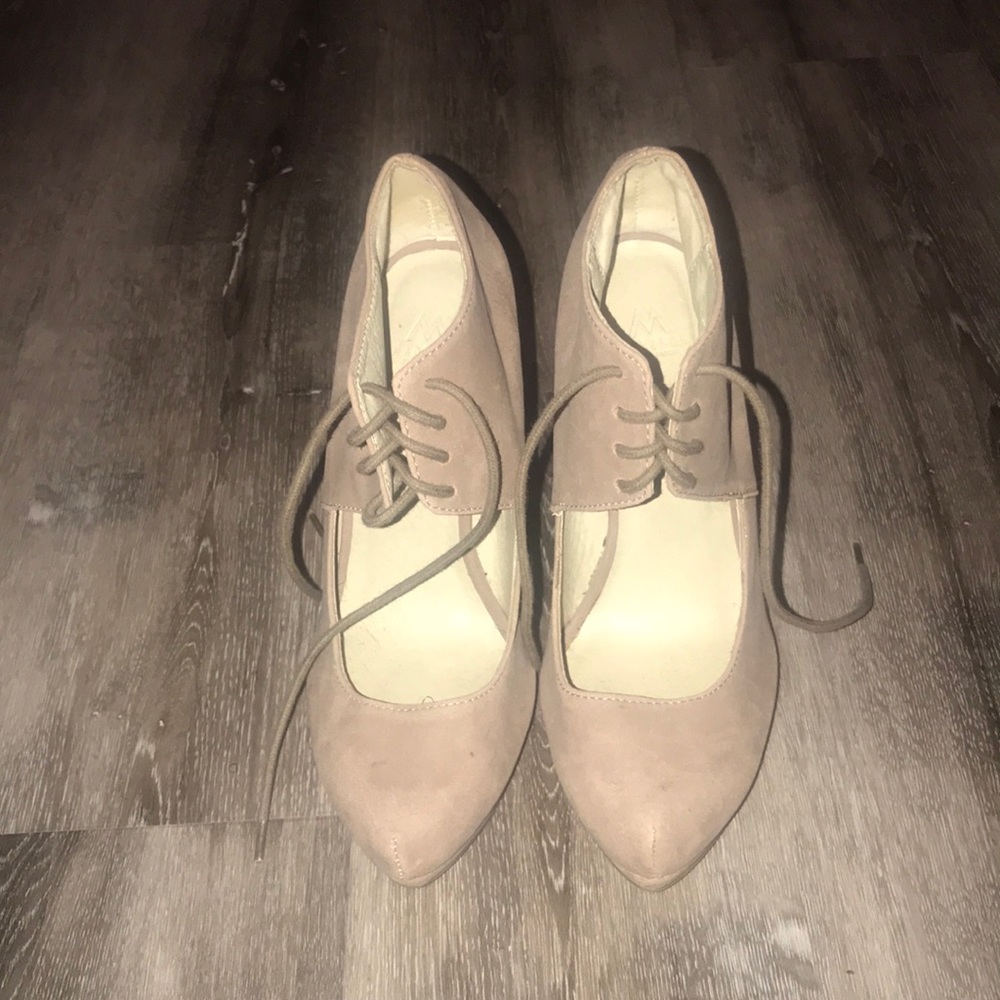 Nude/Tan Wedged Pointed toe heels with Laces.
